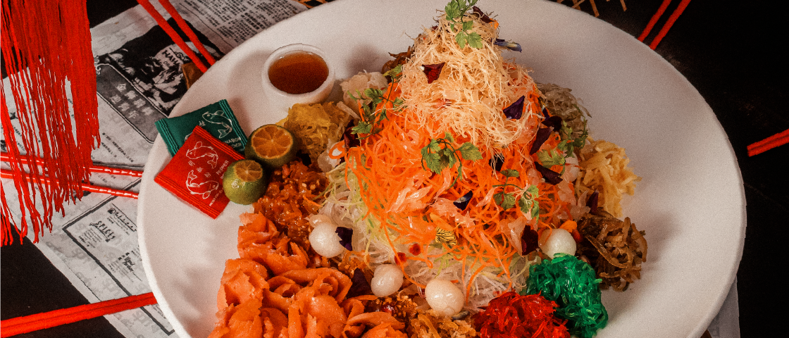 CNY catering featuring a plate of yusheng